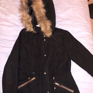 Winter jacket with a fur hood
